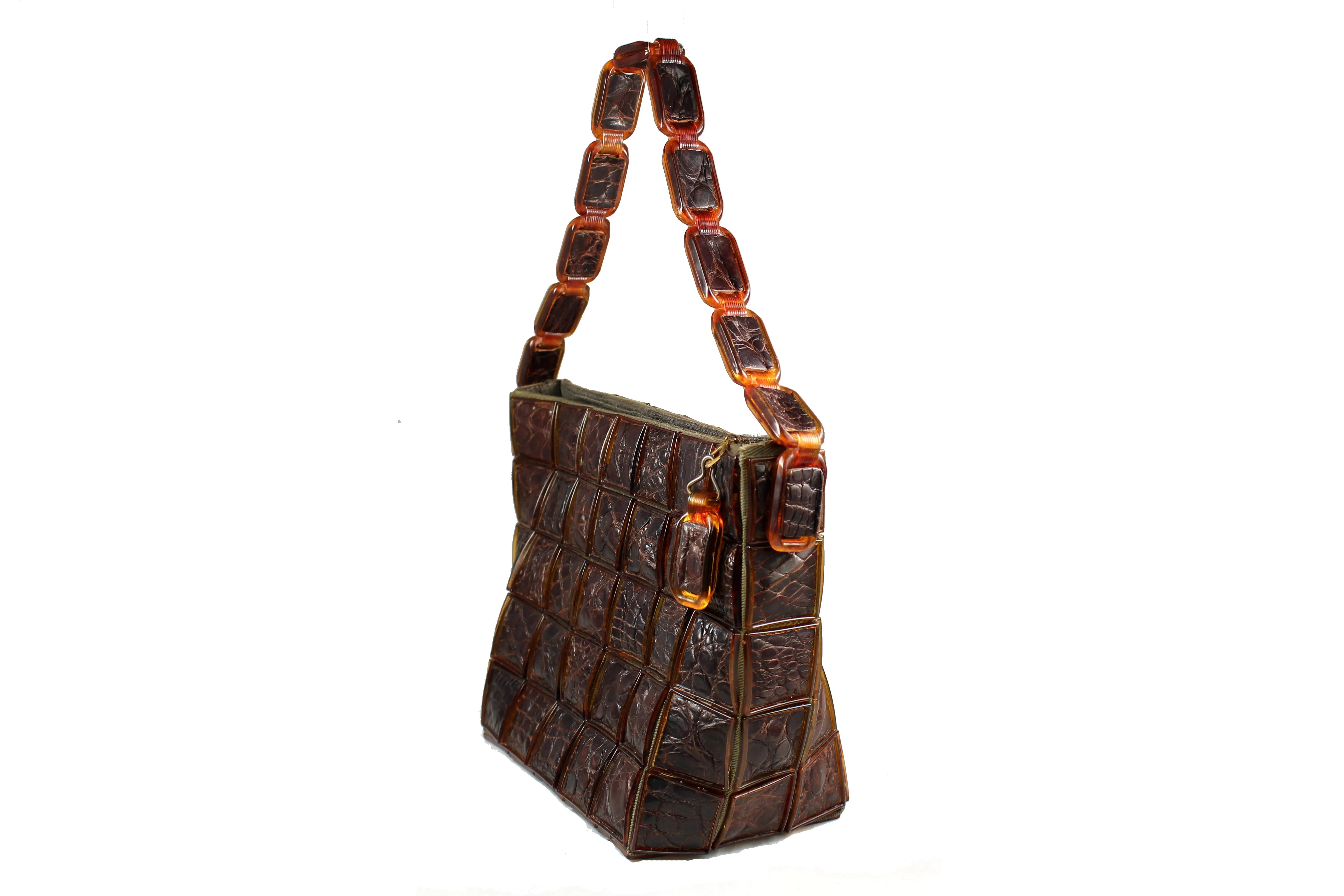 brown handbag in crocodile skin tiles