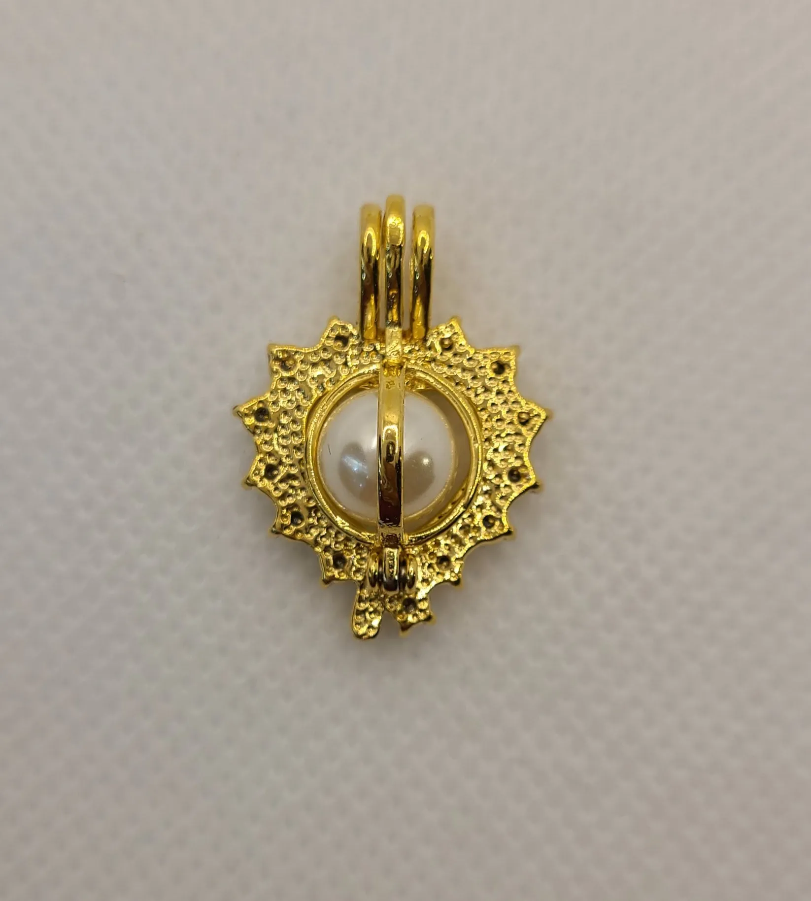 Gold plated pearl pendant